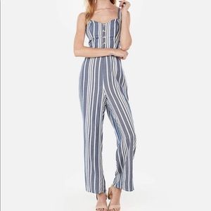 Striped button front cutout jumpsuit.